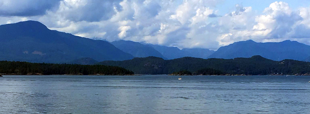 photo of mountains and ocean